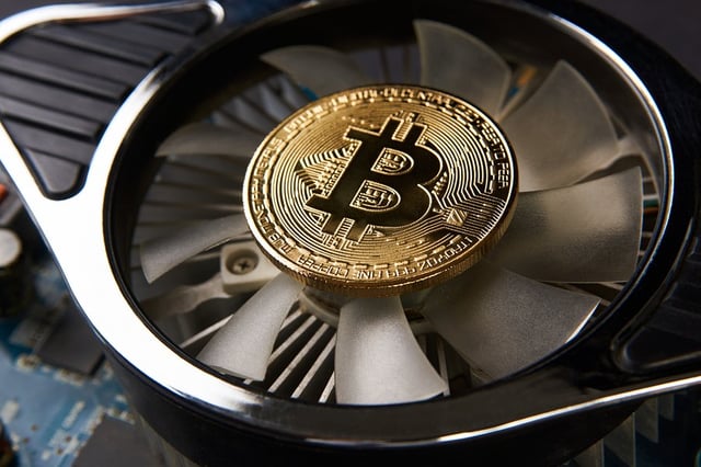 Mining Company Unveils New Eco-Friendly Bitcoin Miners at Bitcoin 2024.